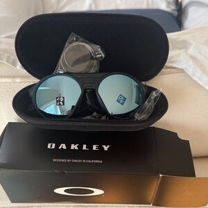 Oakley Black Frame Sunglasses with Mirrored Blue Lenses